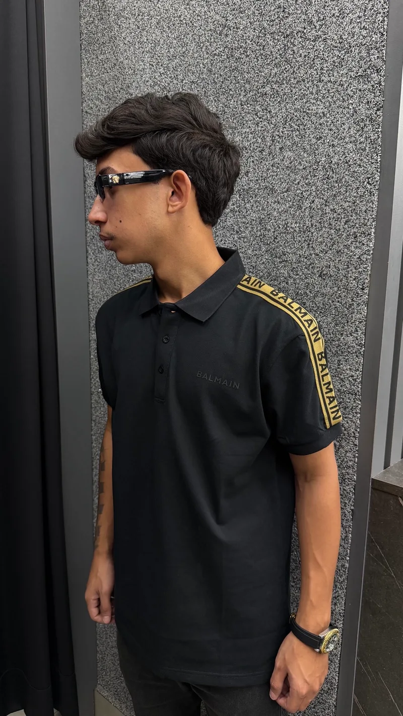 Polo Balmain Preta/Dourado 911